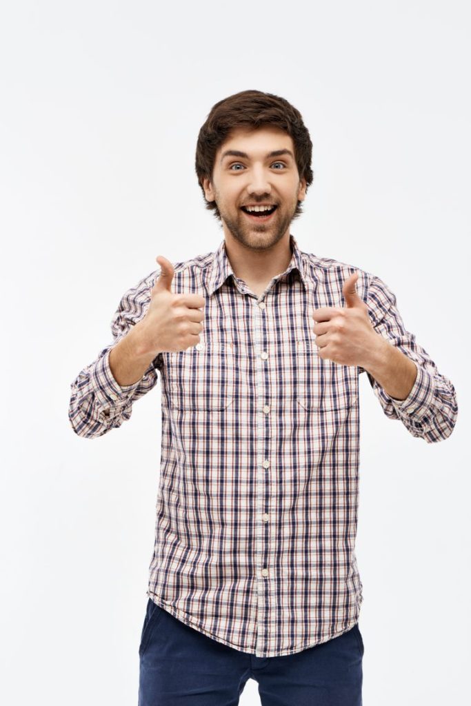 portrait handsome happy young man looking camera showing 768x1151